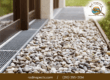 Gravel and drainage system outside a home inspected by Rod Inspects in San Antonio TX for foundation and water management
